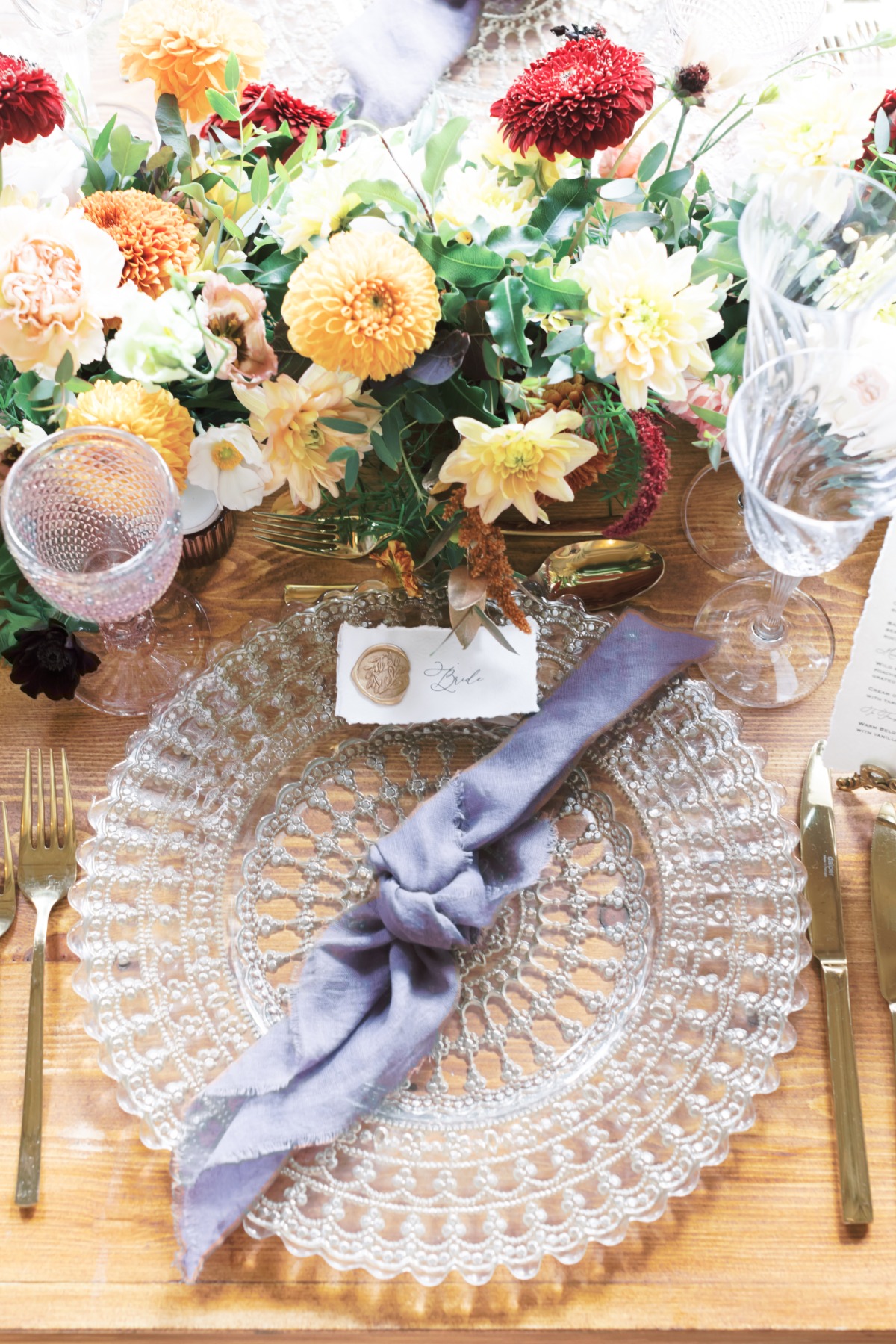 Elegant wedding table setting with flowers and lace plate