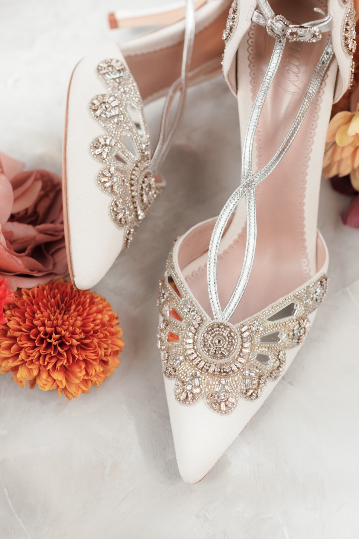 Elegant ivory heels adorned with sparkling crystal details