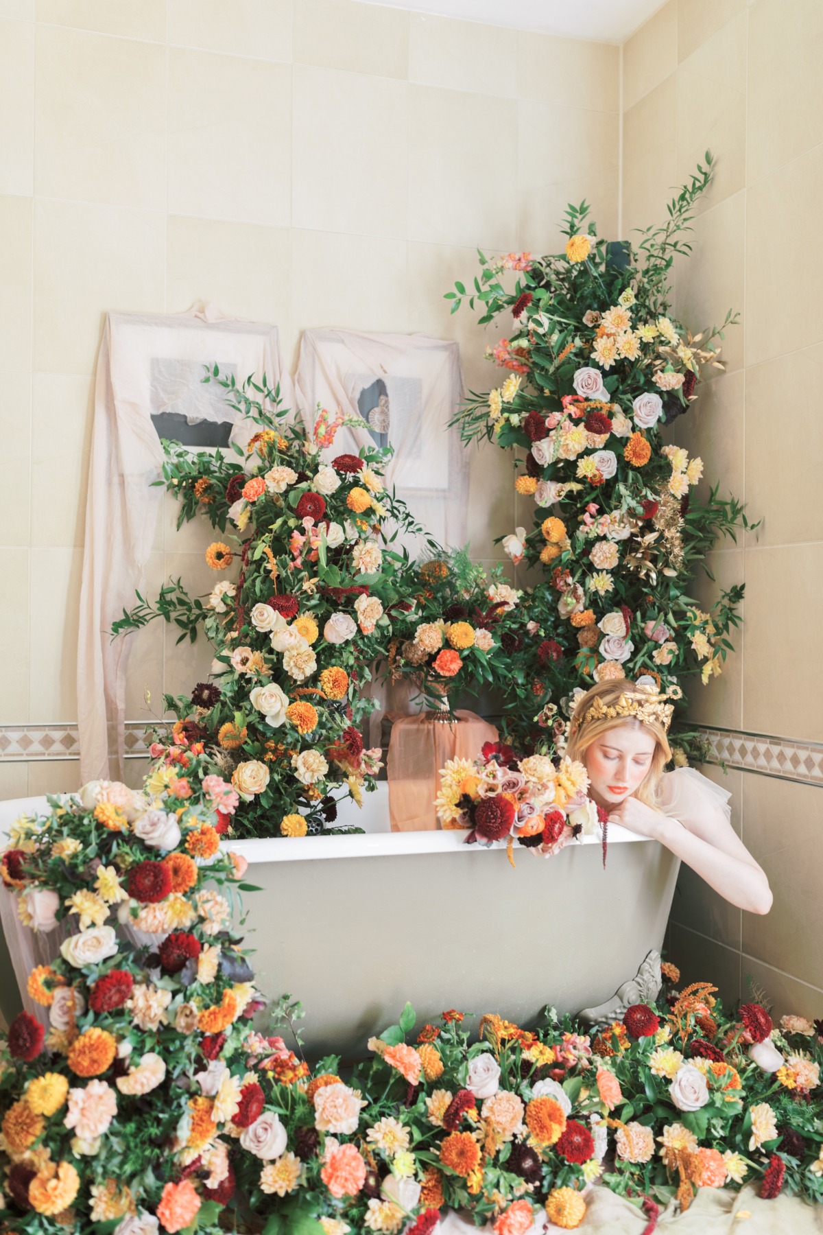 Woman in floral bath with crown fairytale aesthetic