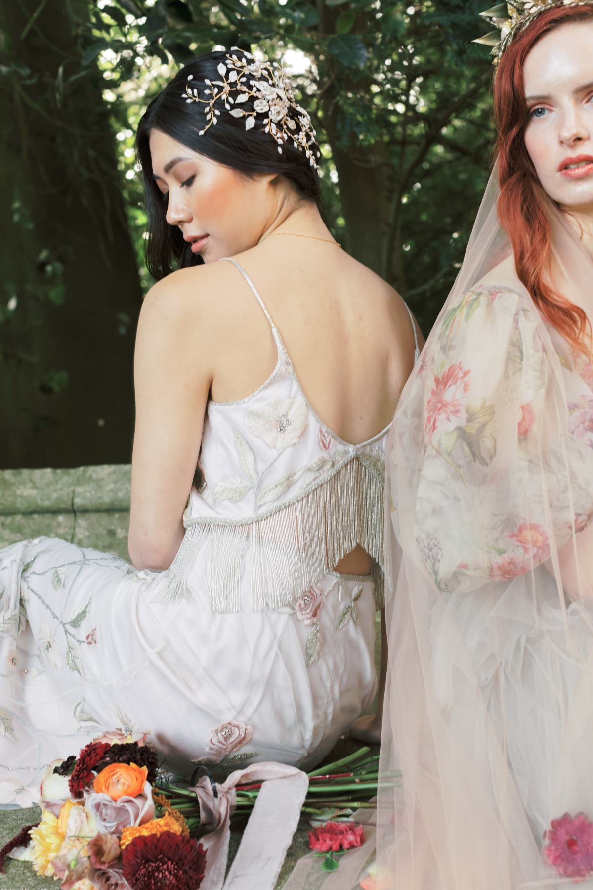 Bride in a floral dress with a beautiful hair accessory and veil