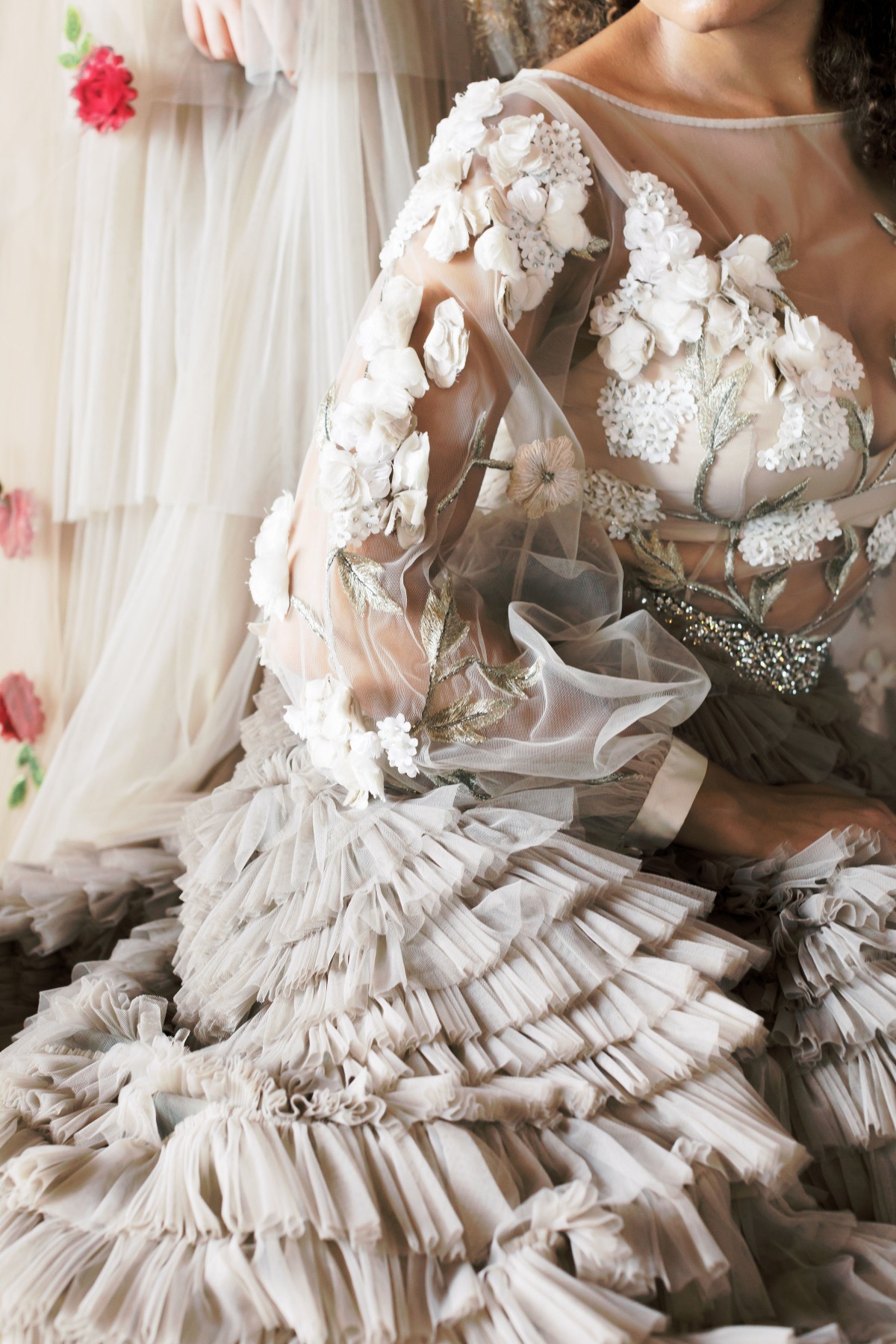 Floral embroidered gown with layered tulle skirt detail