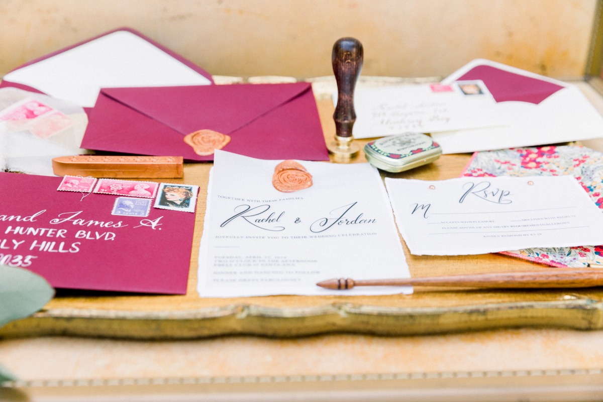 Elegant wedding stationery with wax seals and calligraphy