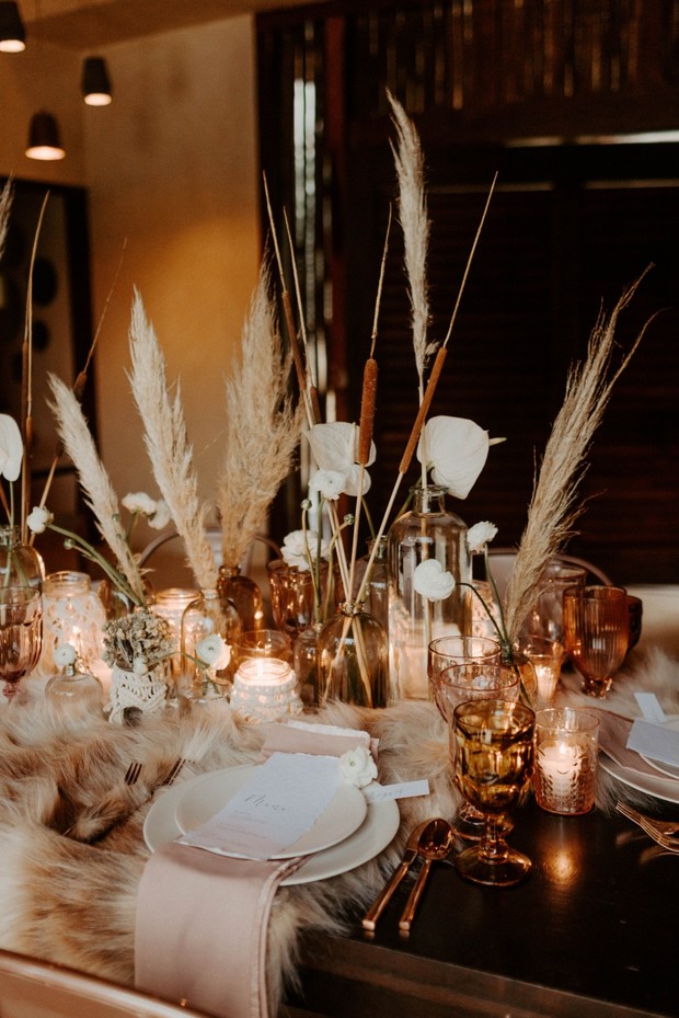 Elegant wedding table setting with pampas grass decor