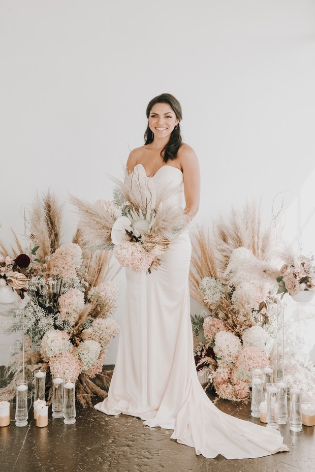 neutral soft floral backdrop for your wedding ceremony
