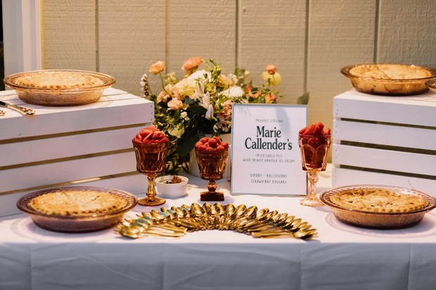 A beautifully arranged dessert table featuring Marie Callender's pies and treats