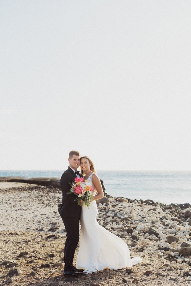 Bride and groom portrait at beach wedding ceremony
