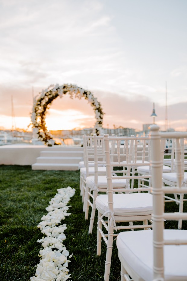 outdoor wedding ceremony at sunset