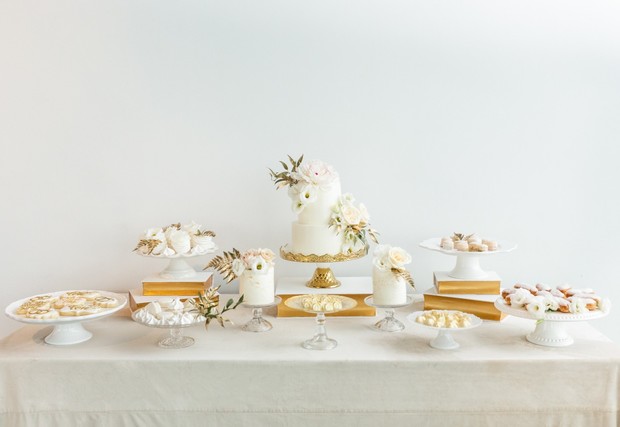 gold and white wedding cake table