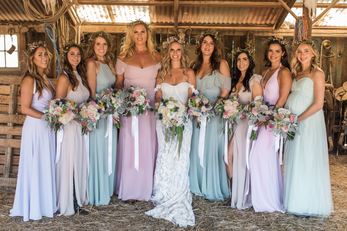 mismatched bridesmaids in pastel dresses