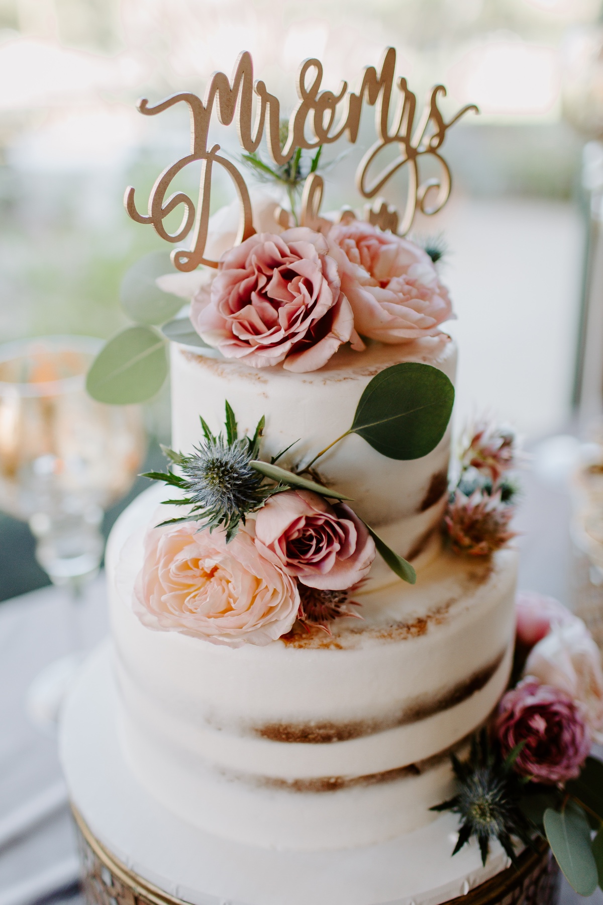 Naked cake with gold cake topper