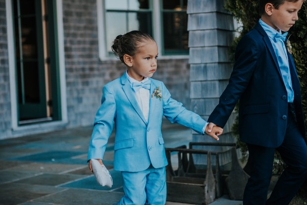 ring bearer in blue suits