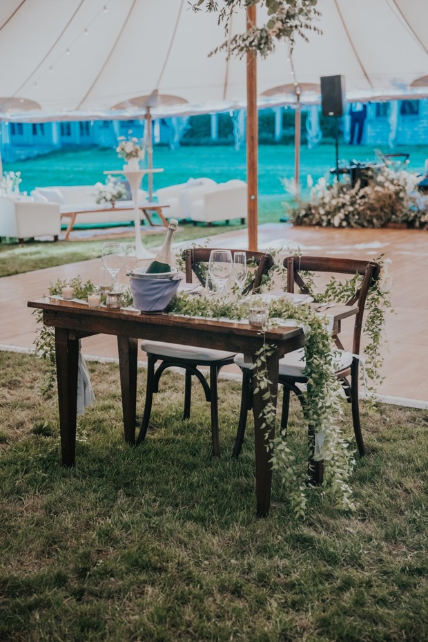 simple sweetheart table with greenery