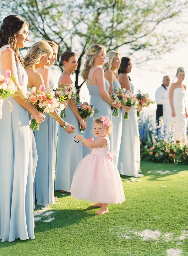 pastel blue bridesmaids and pink flower girl