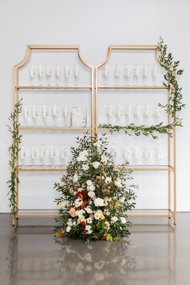 wedding seating chart with champagne glasses