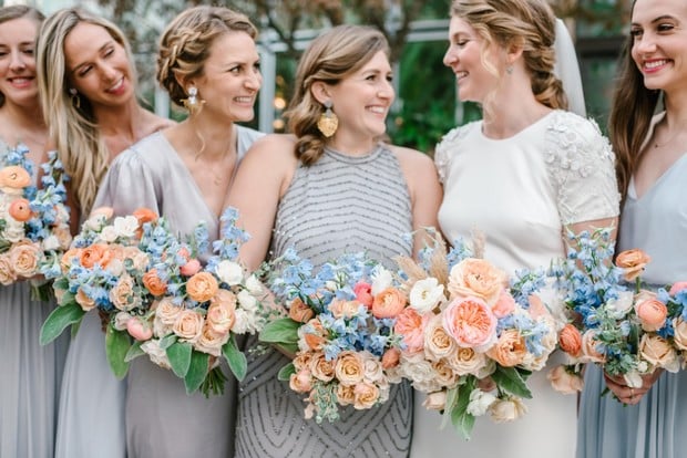 peachy pink and blue bridesmaid bouquets
