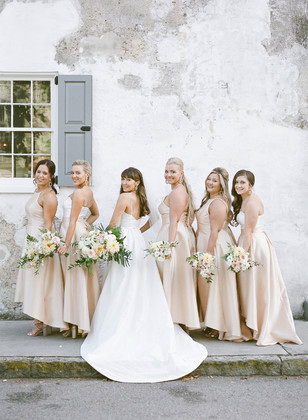 bridesmaids in soft champagne high low dresses