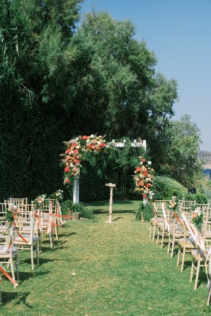 wedding back drop with peach and cream florals