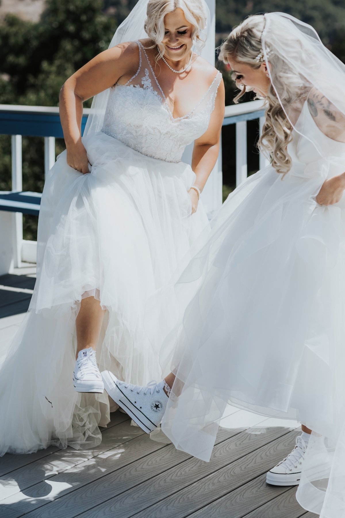 Brides in matching wedding converse