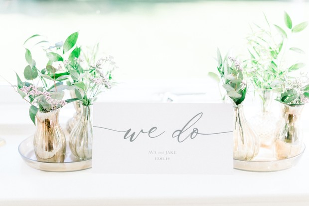 Wedding decoration with flowers and We Do sign for the ceremony