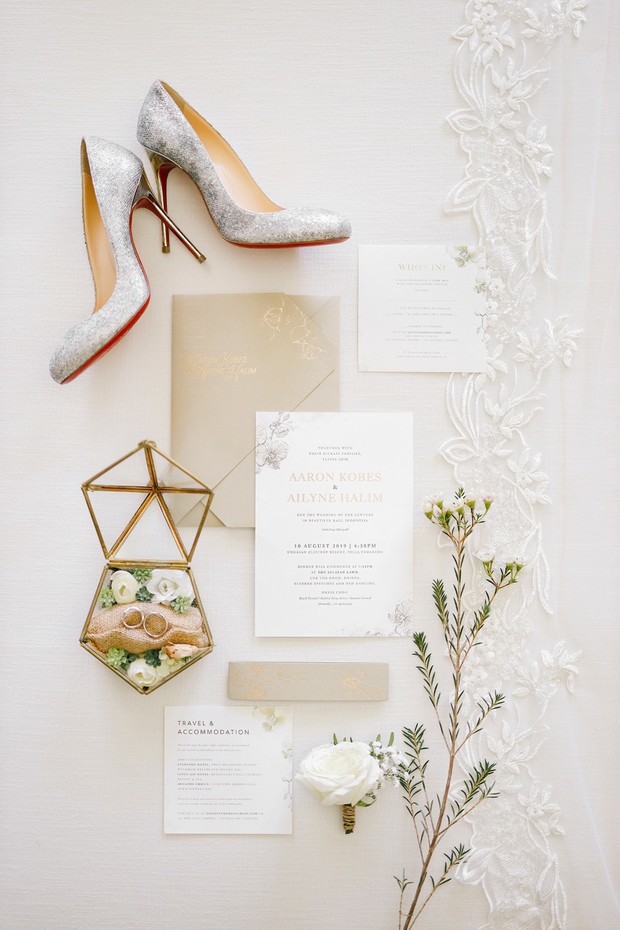 flat lay styling with Christian Louboutin silver wedding shoes