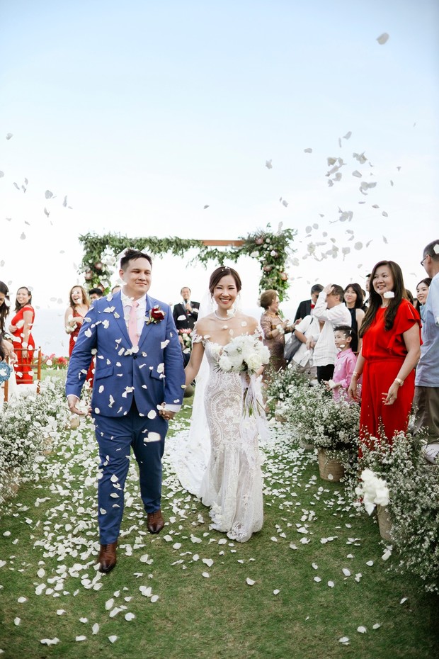 wedding ceremony exit where guest threw rose petals
