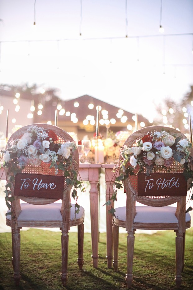bride and groom decorated chairs
