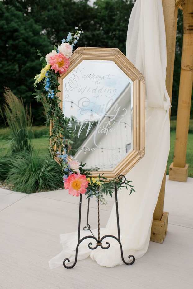 welcome wedding sign on vintage mirror