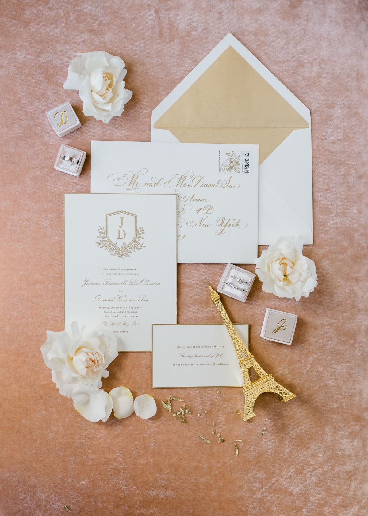 Elegant wedding invitation set with floral accents and Eiffel Tower decor