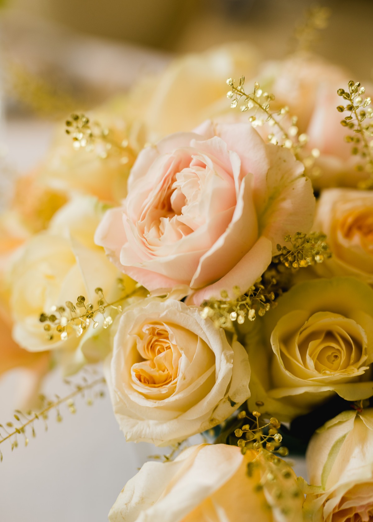 Close-up of a stunning bouquet of delicate pastel colored roses