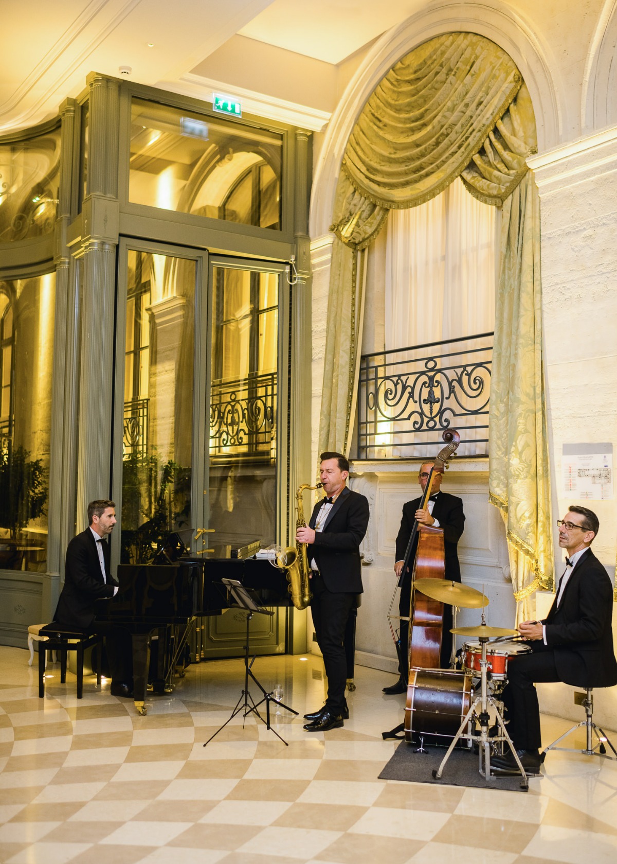 Jazz band playing music in a luxurious venue with checkered floor
