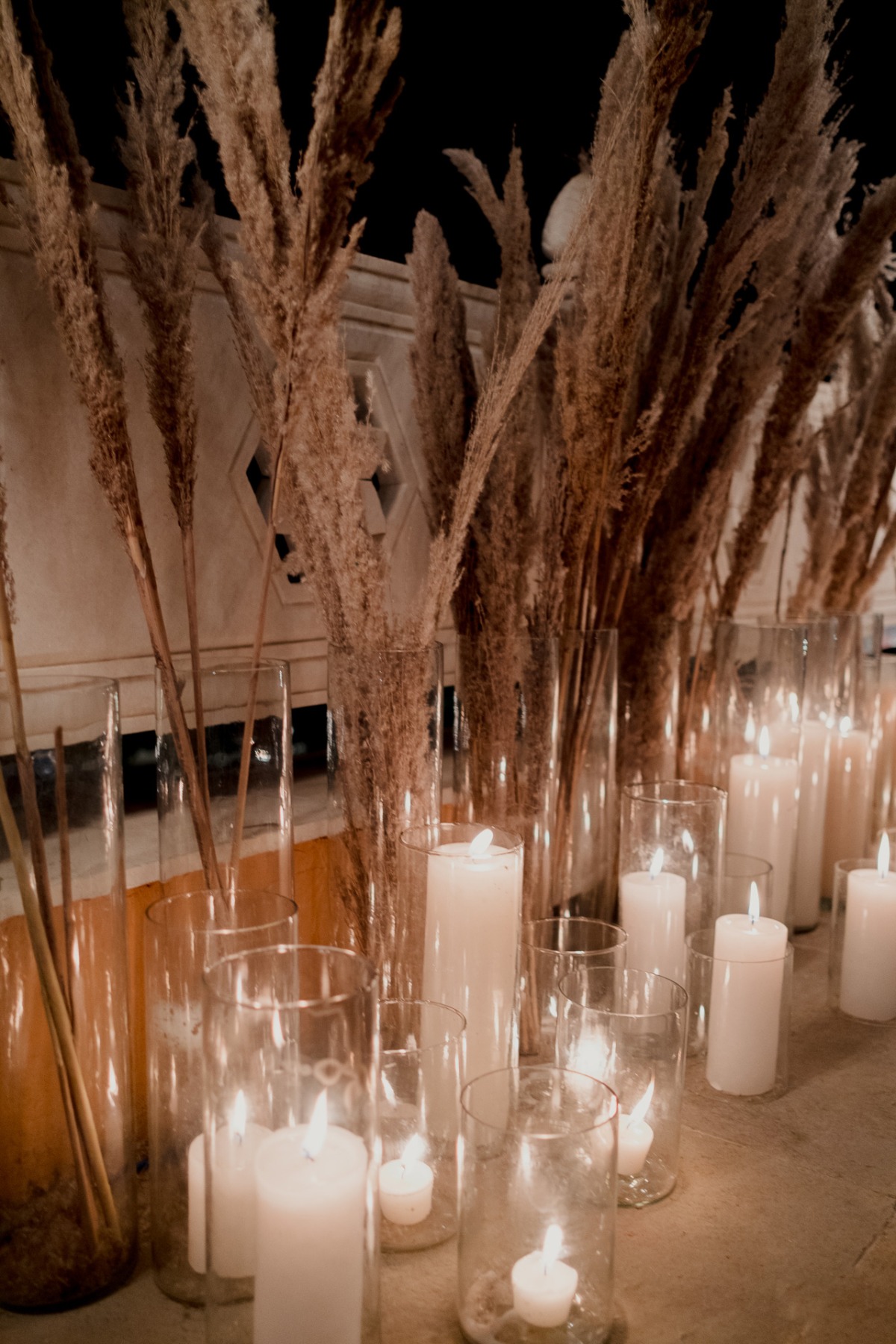 dried grasses and candles