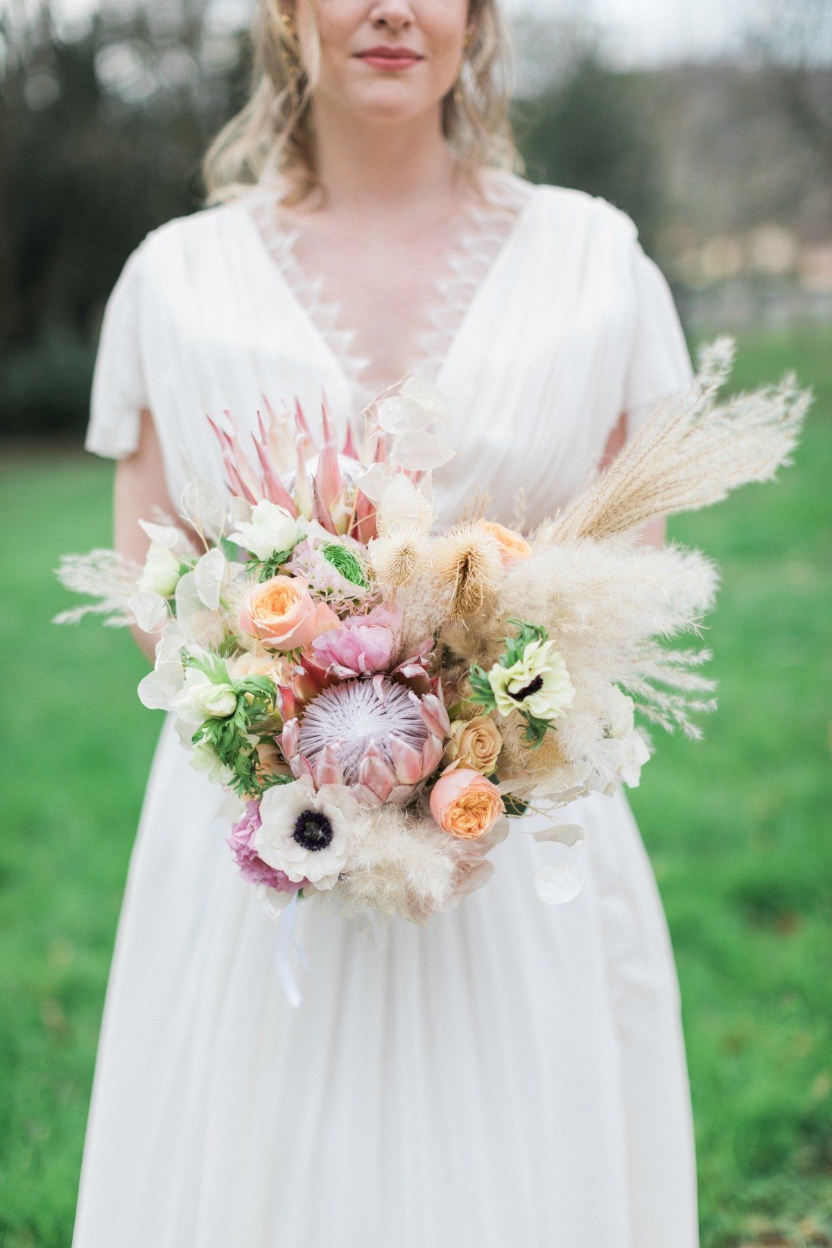 protea wedding bouquet with pampas grass