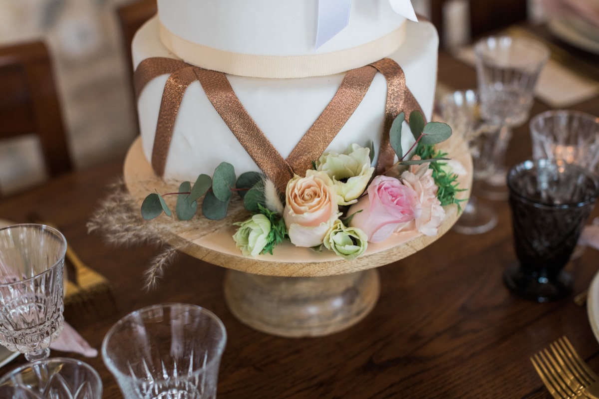 wedding cake with copper accents