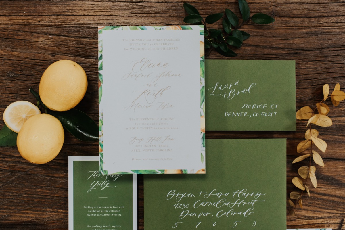 Wedding invitation with lemons and greenery, rustic aesthetic