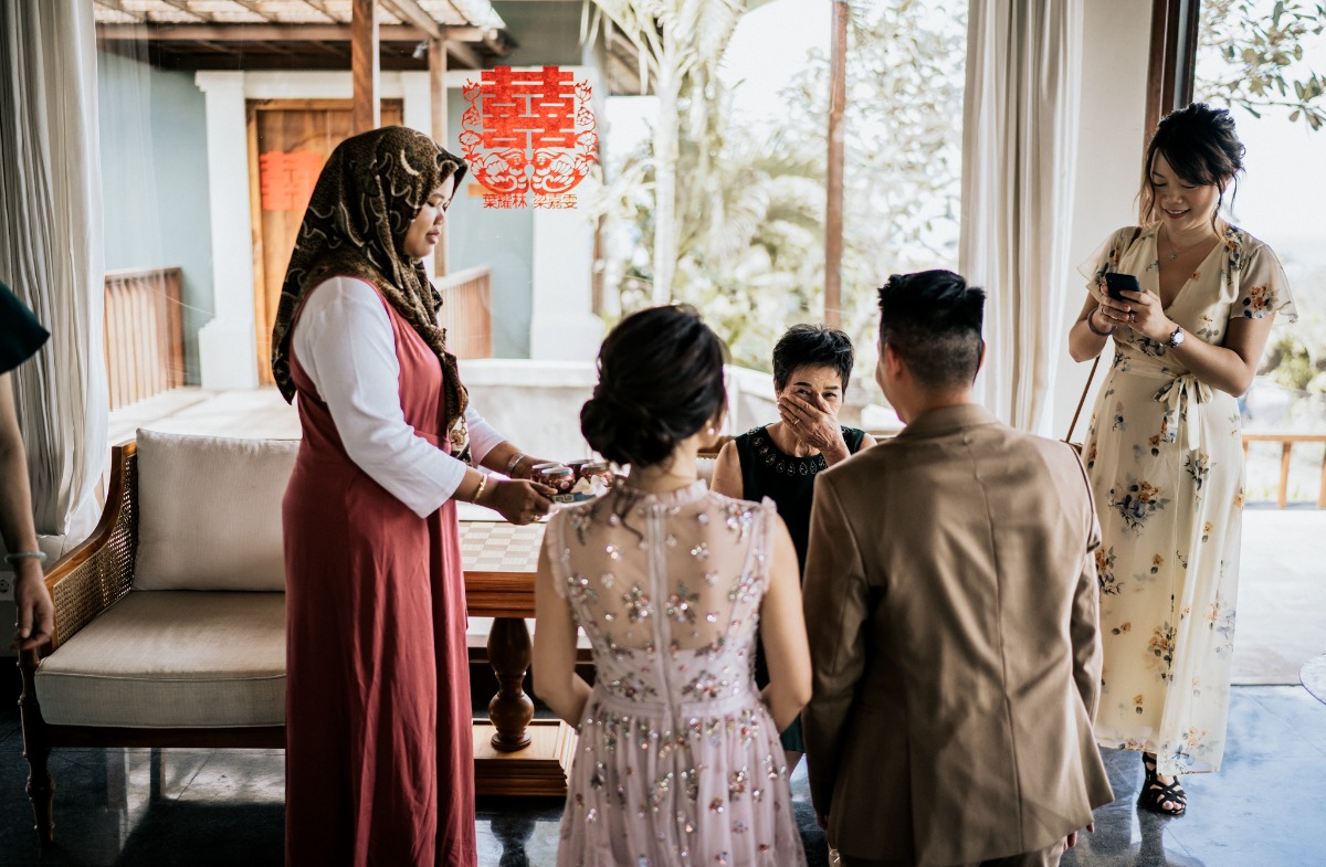 Formal wedding ceremony with guests and emotional reactions