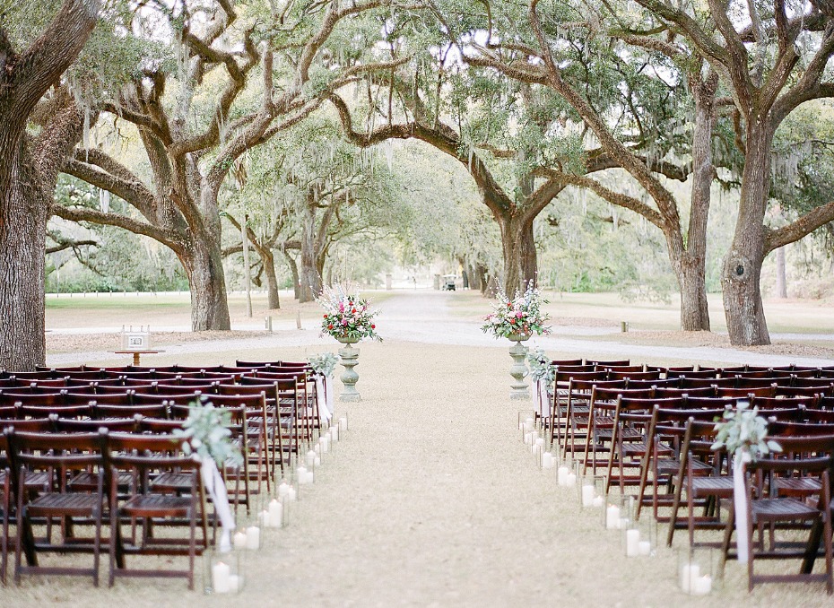 Wedding ceremony setup under beautiful old oak trees