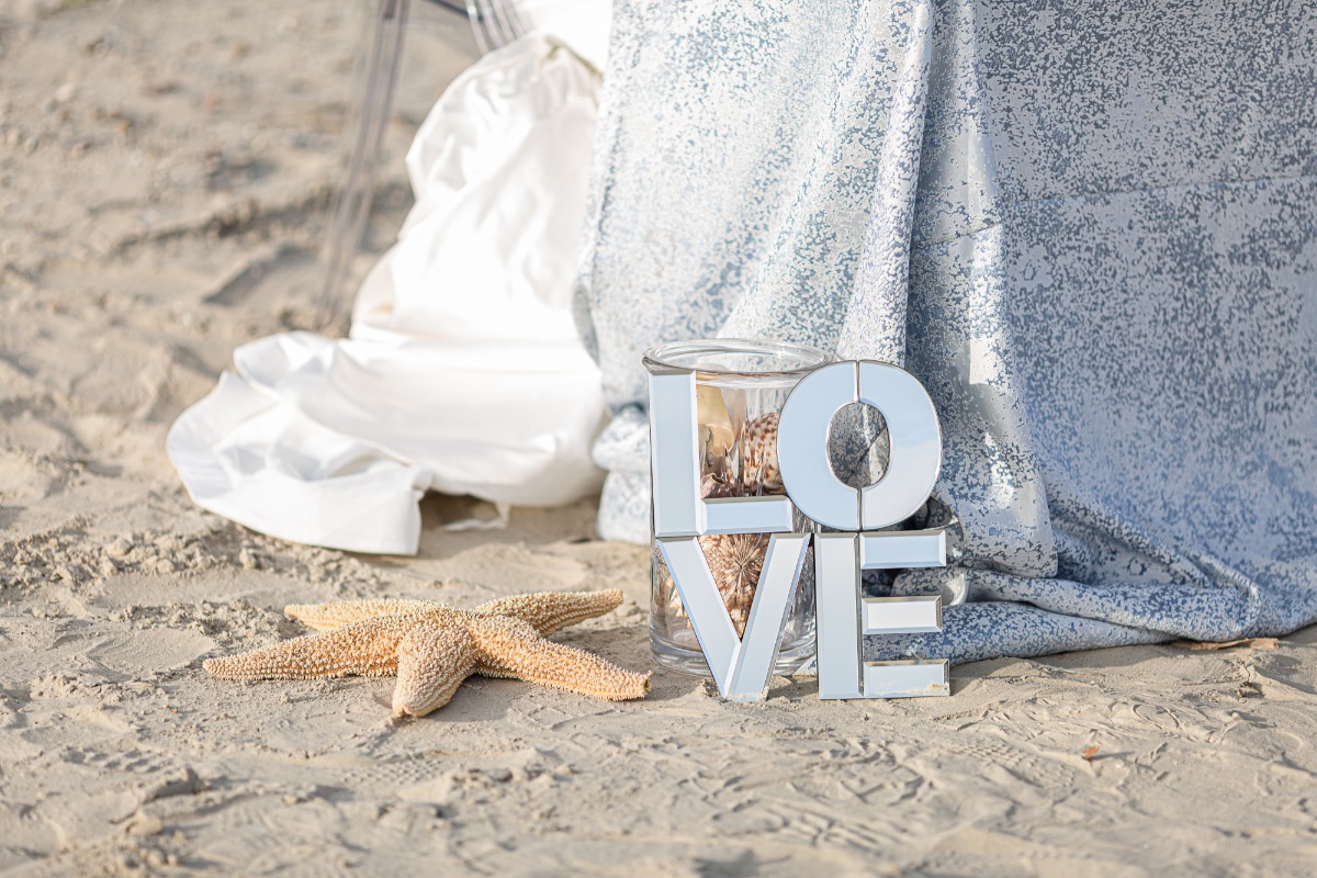 sweetheart table setup at beach