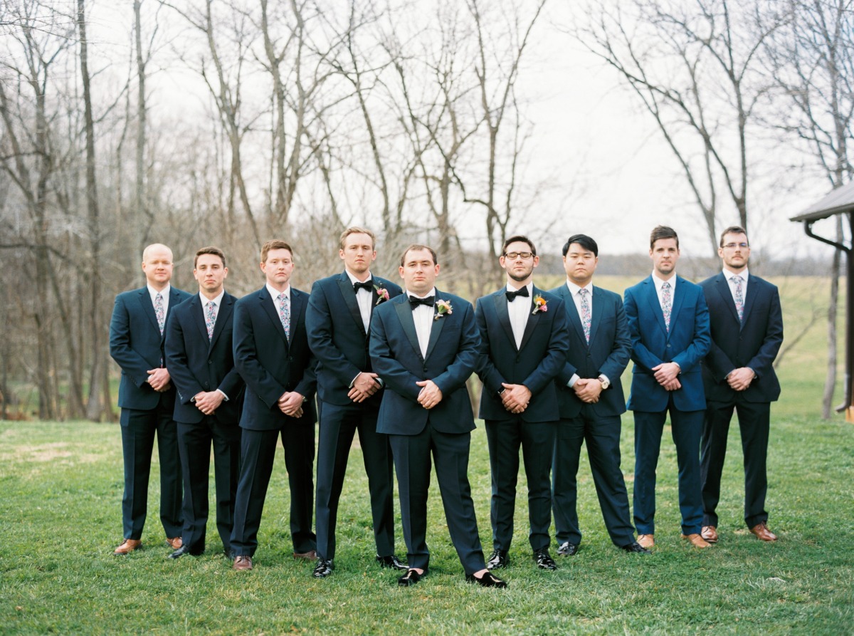 grooms in mismatched outfits
