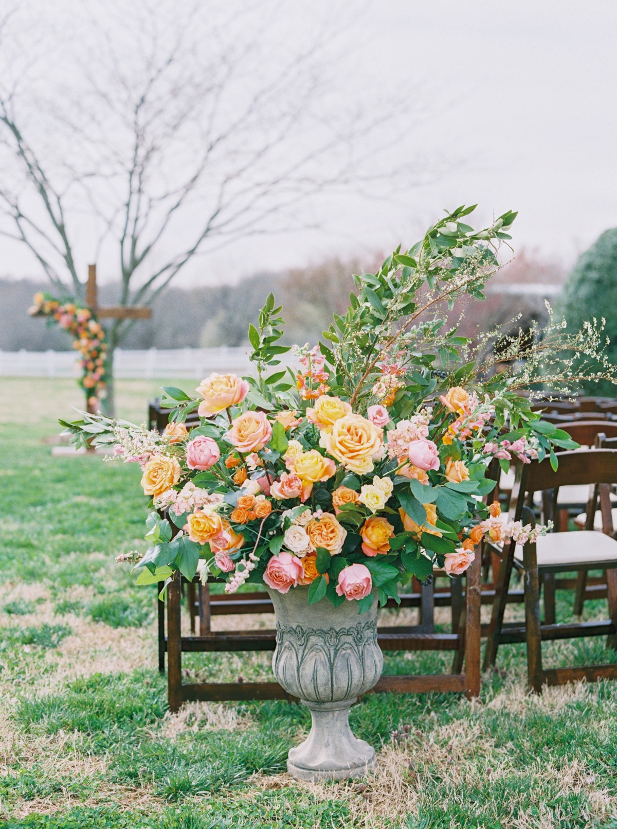 wedding aisle floral arrangement