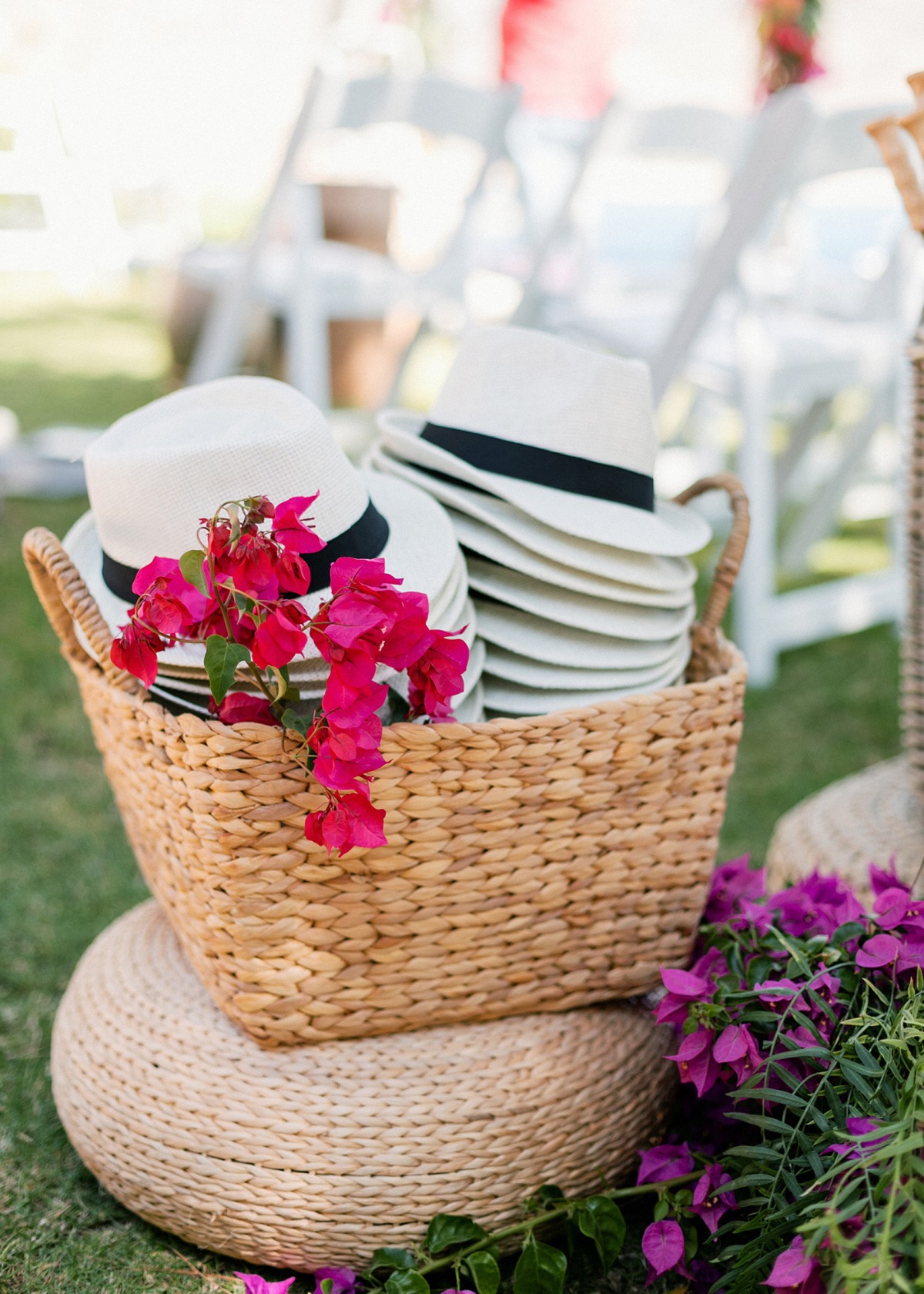 wooden fans, panama hats and parasols to cool off during the ceremony