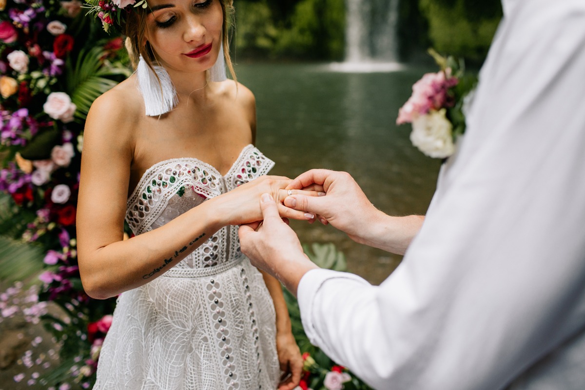 tropical elopement in Bali next to waterfall