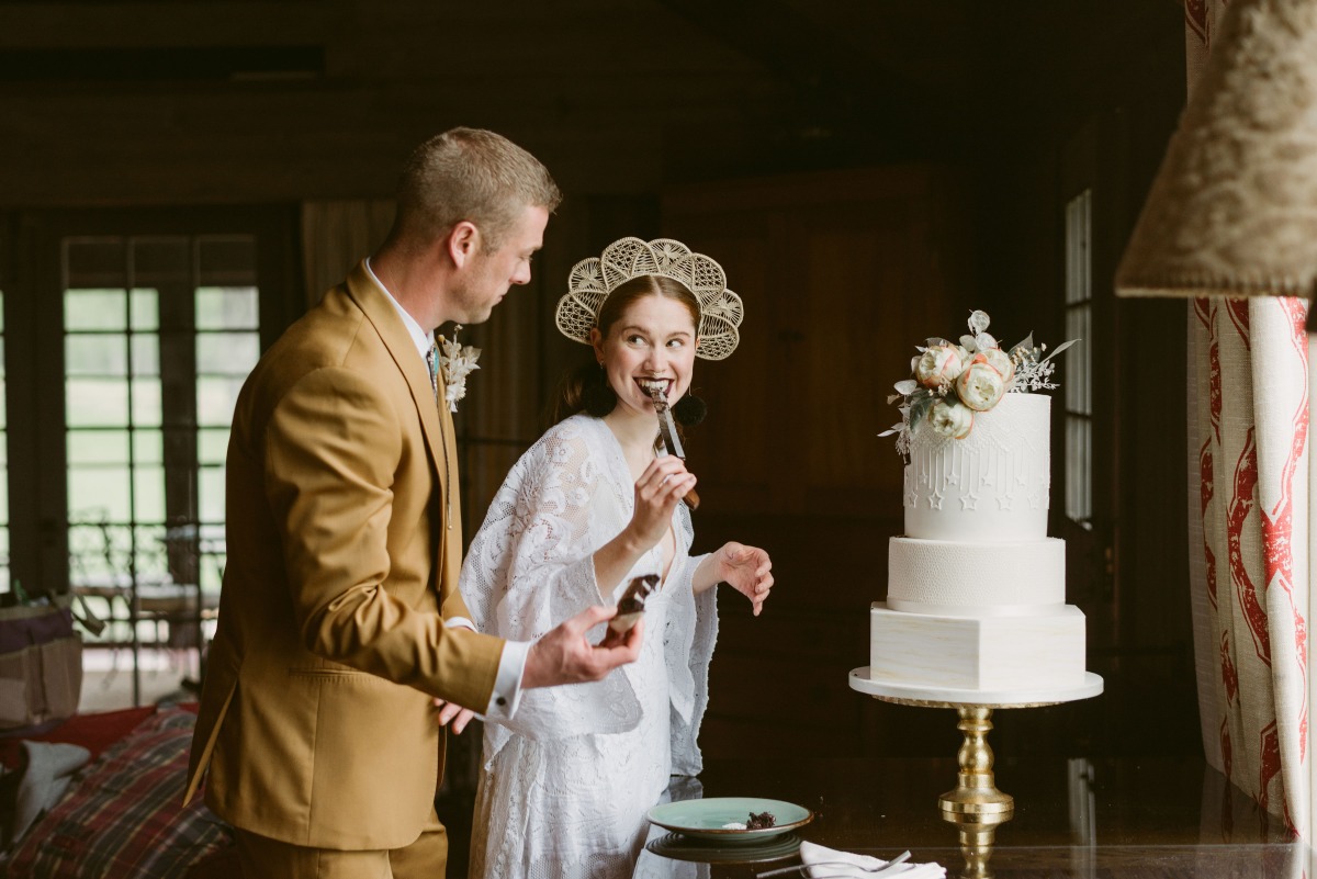 bride and groom eating cake