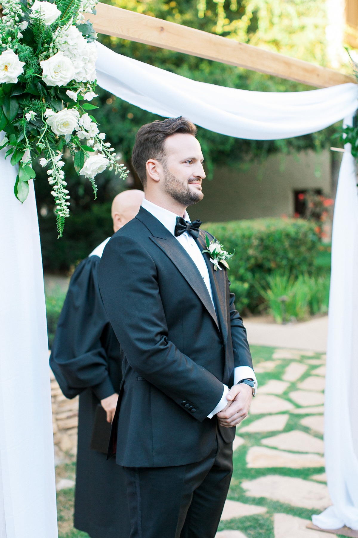 groom waiting for bride to walk down aisle
