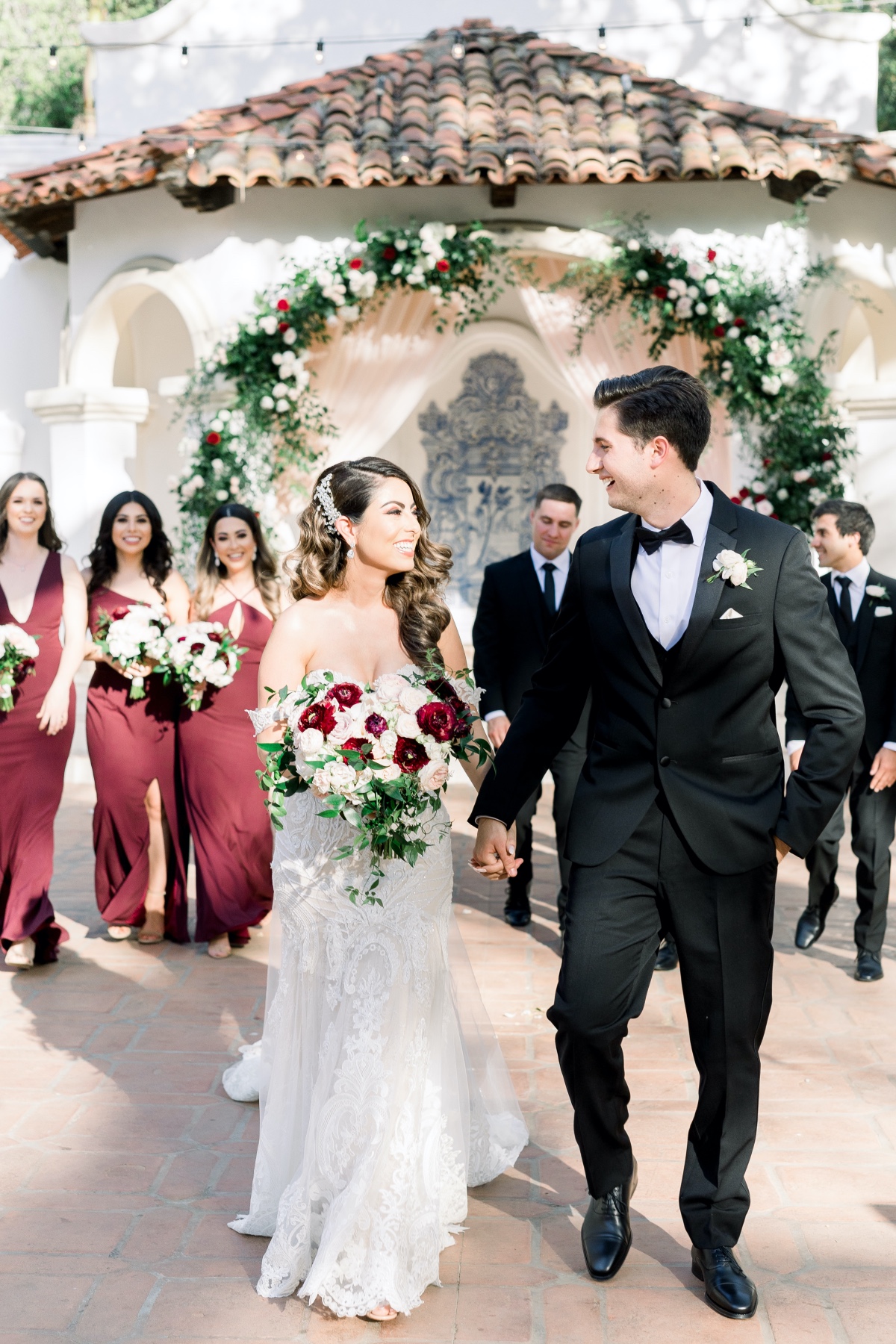 Bride and groom walking at outdoor wedding ceremony