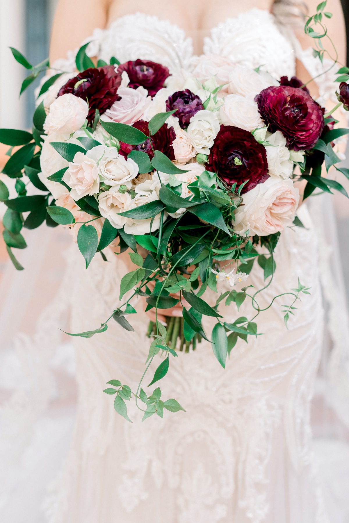 Burgundy and blush wedding bouquet with greenery