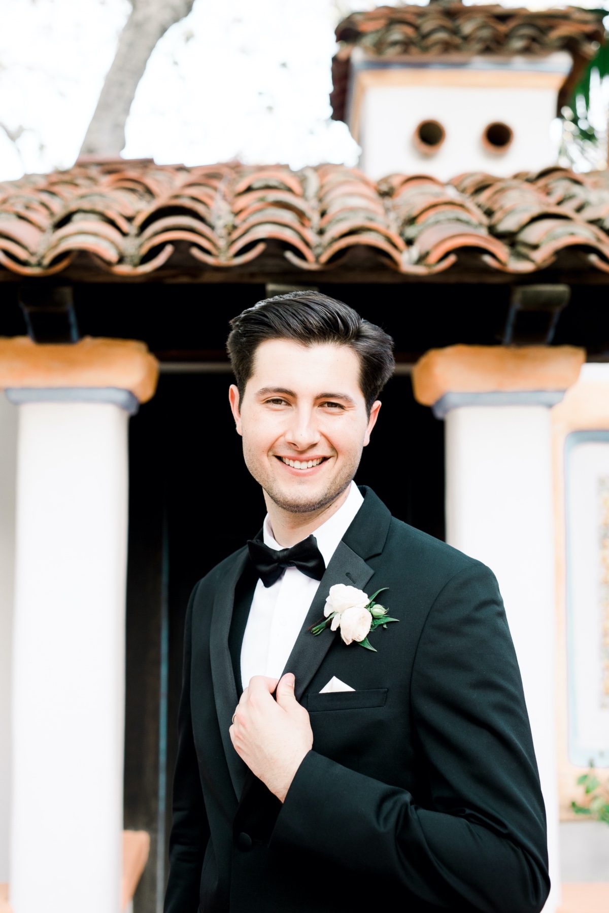 Groom in Tuxedo with white boutonniere
