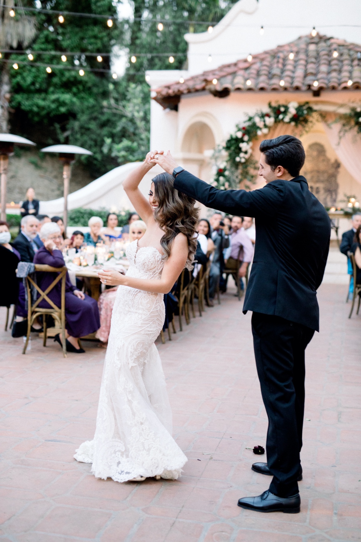 Bride and groom share their first dance at their wedding