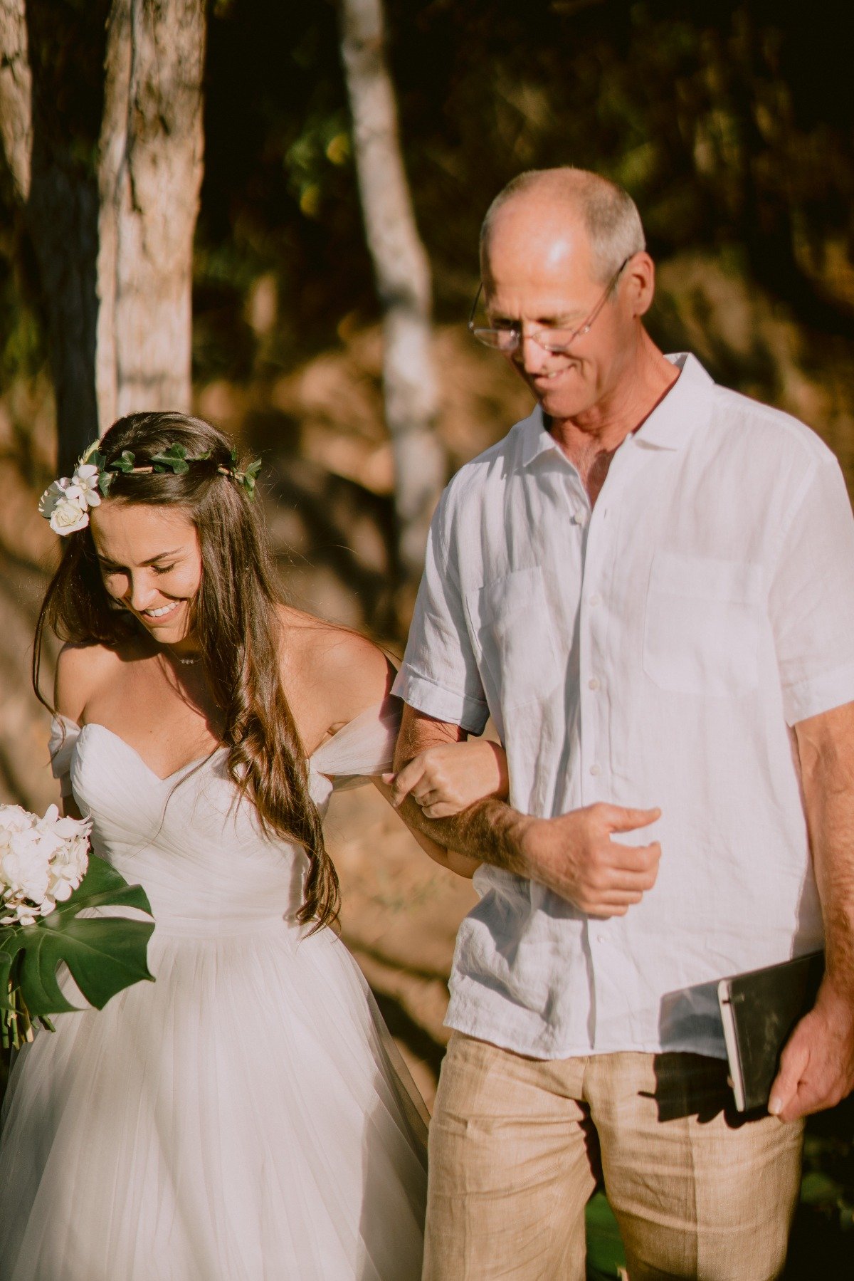 bride being walked down aisle by Dad