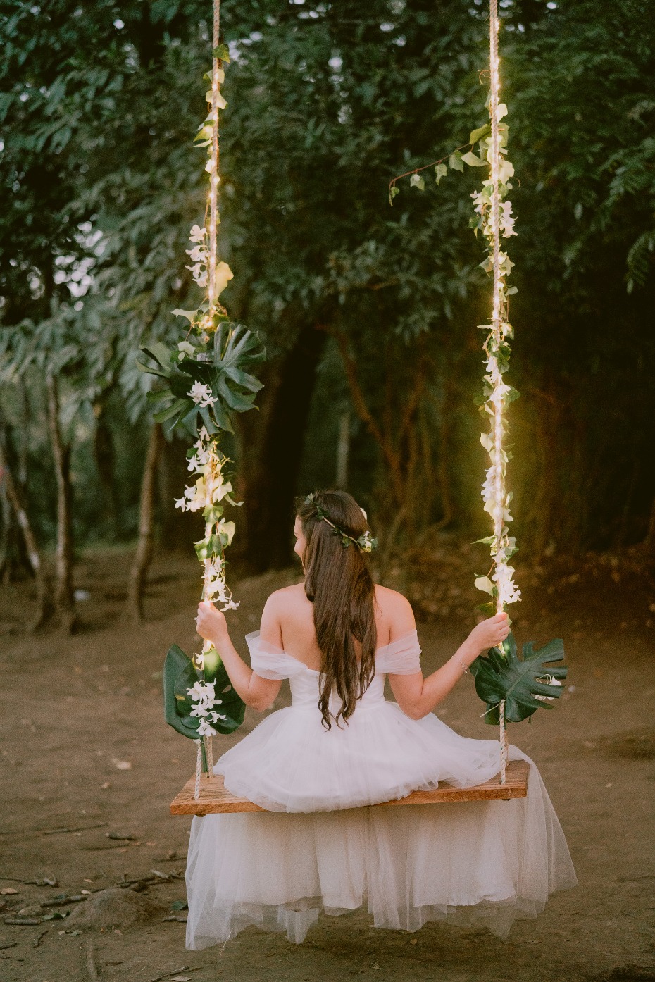 bride on lit up swing