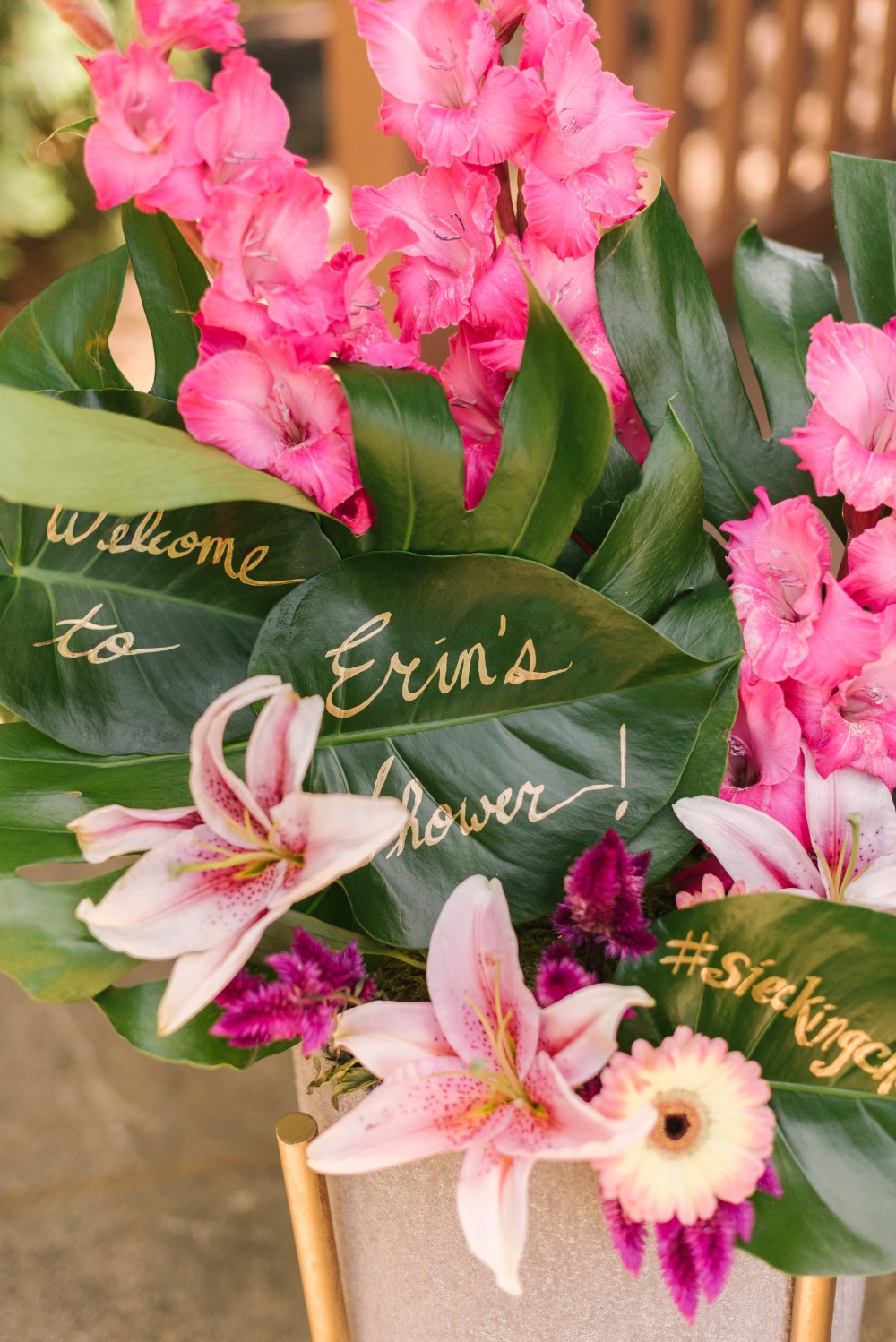 Welcome floral arrangement and tropical bridal shower